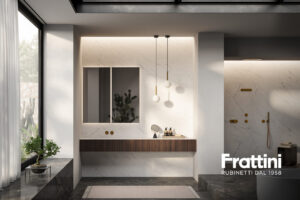 Modern bathroom design featuring a sleek Frattini Pepe XL deck-mounted tap in matte black and brushed brass, paired with a raw stone basin.