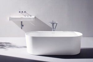 Modern bathroom design showing a Laufen Val round ceramic washbasin with a dark exterior on a wall-hung oak vanity unit against fluted tiles.