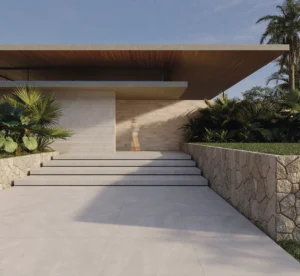 Modern villa entrance with concrete-look stone steps and large-format exterior floor tiles from the Portobello Thera Off-White collection.
